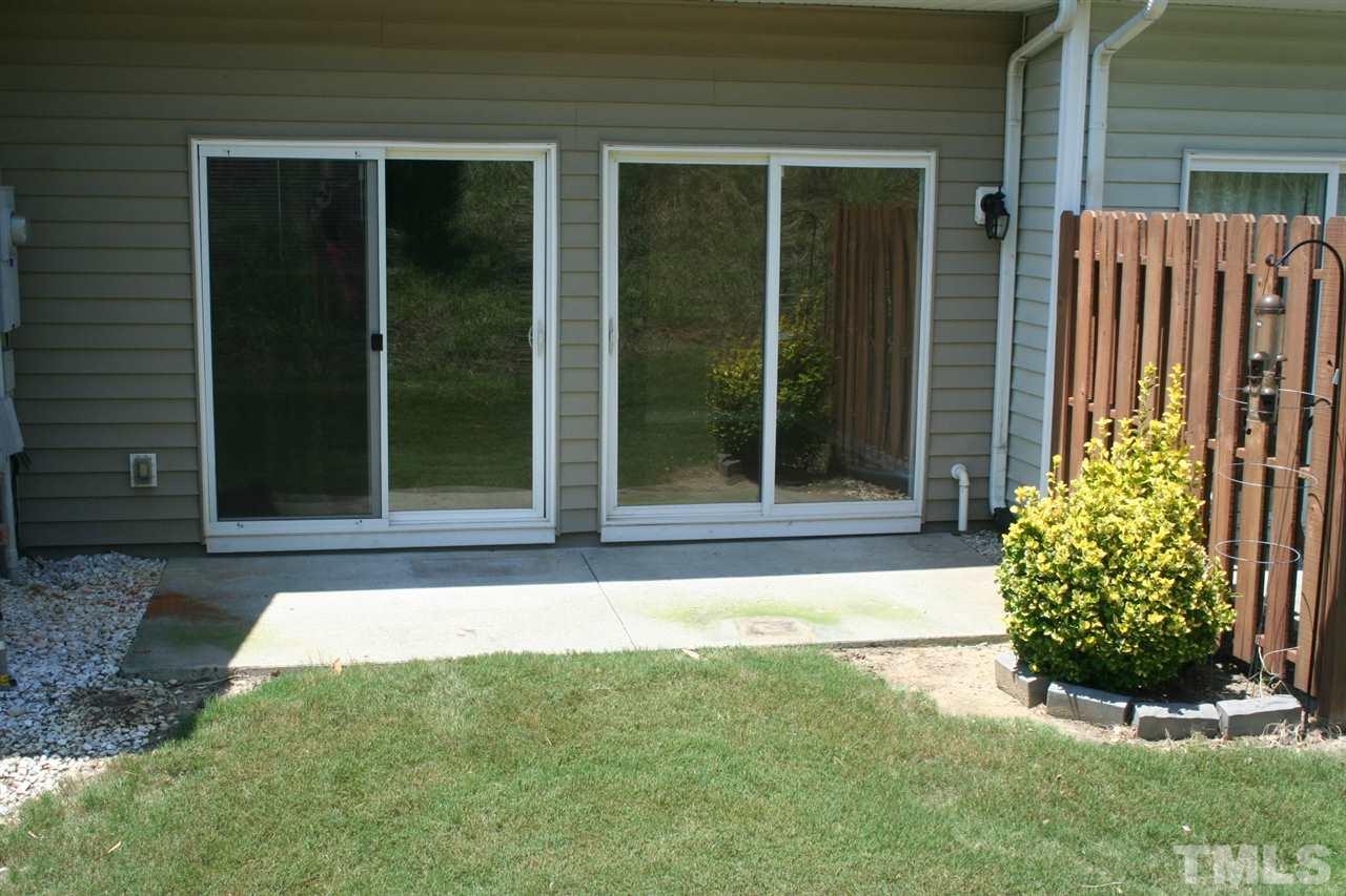 5025 Echo Ridge Road Raleigh, NC 27612 - Photo 10 of 18 front view of a house with a yard