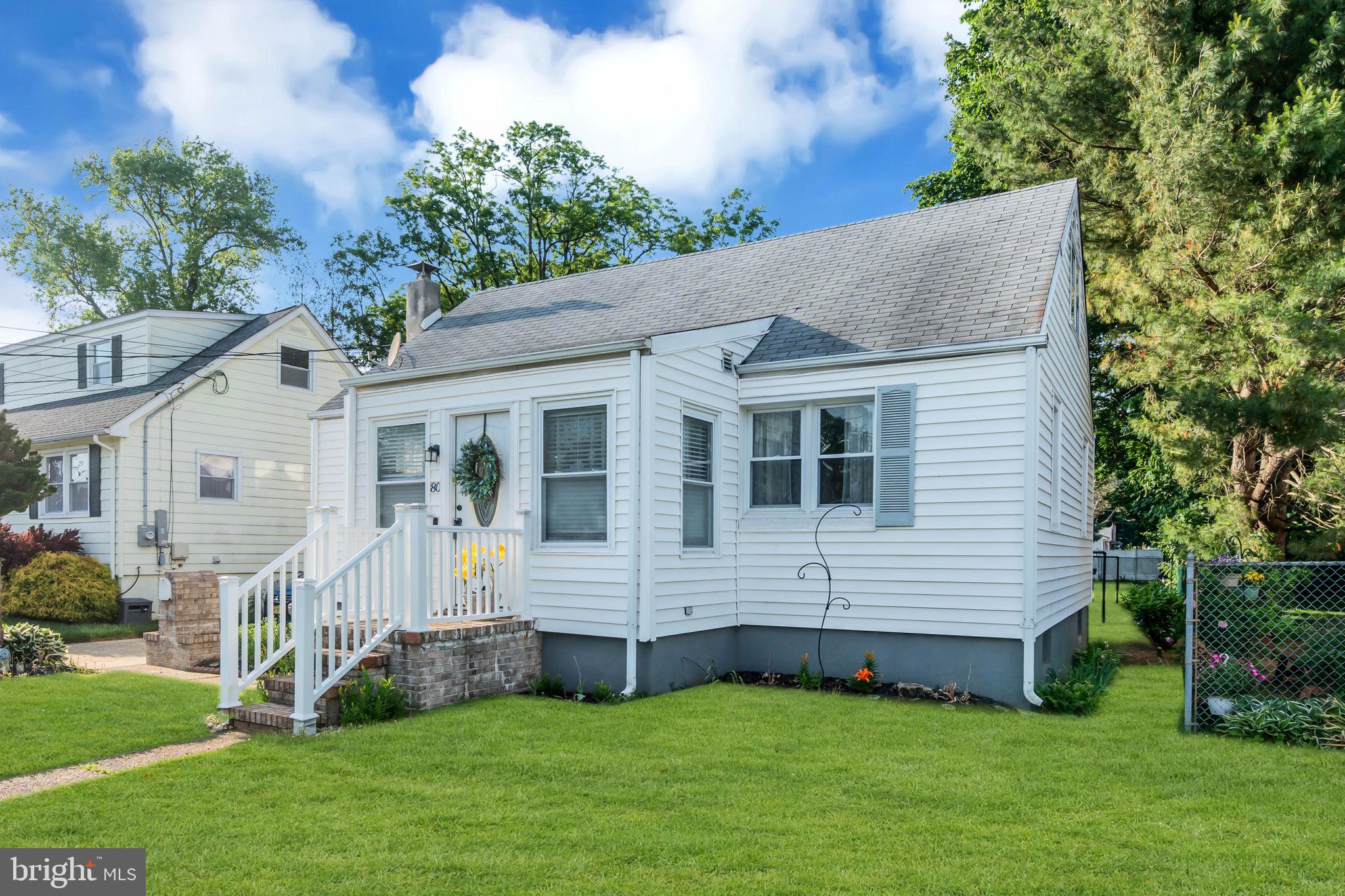80 Locust Avenue Hamilton, NJ 08620 - Photo 2 of 24 a view of a house with a yard and tree