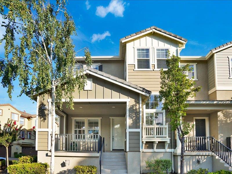 a front view of a house with glass windows