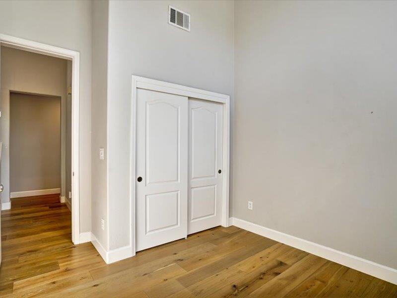 6130 Yardley Lane San Ramon, CA 94582 - Photo 11 of 46 a view of an empty room with wooden floor