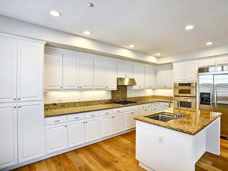 6130 Yardley Lane San Ramon, CA 94582 - Photo 14 of 46 a kitchen with stainless steel appliances granite countertop a sink and cabinets