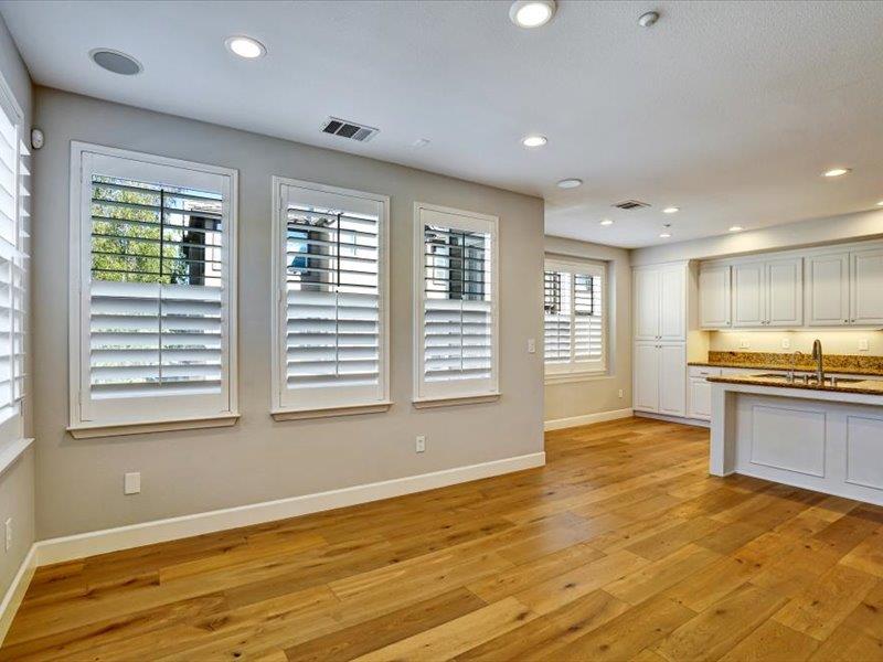 6130 Yardley Lane San Ramon, CA 94582 - Photo 18 of 46 a view of an empty room with a window and wooden floor