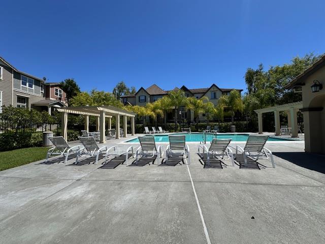 6130 Yardley Lane San Ramon, CA 94582 - Photo 33 of 46 a view of a patio with table and chairs with a yard