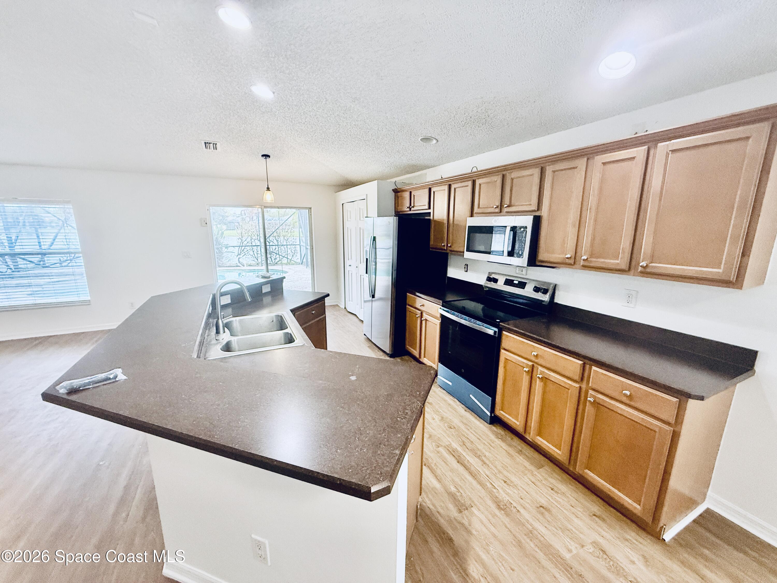 1183 Brumpton Place Rockledge, FL 32955 - Photo 4 of 23 20260317_162523845_iOS