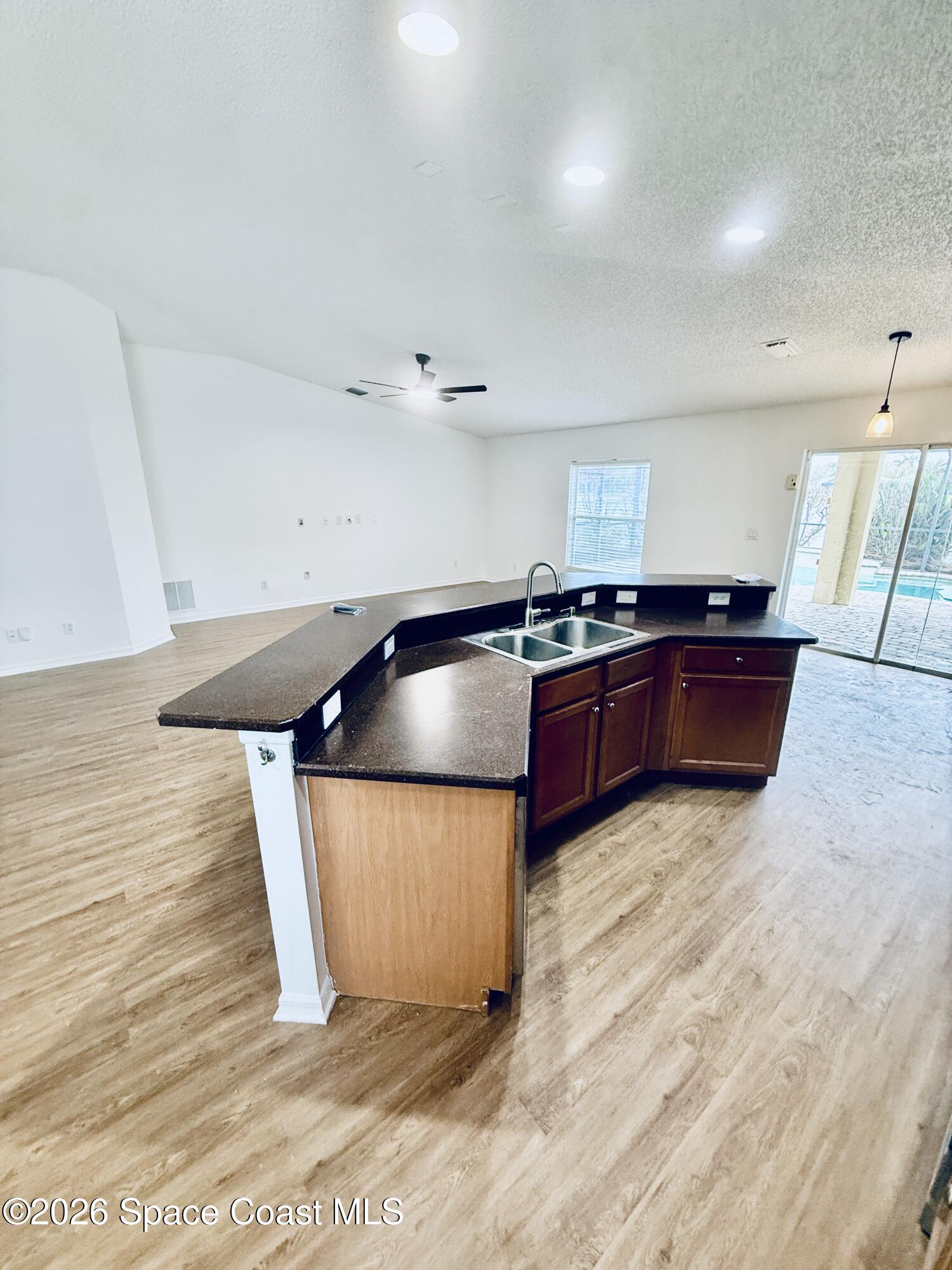 1183 Brumpton Place Rockledge, FL 32955 - Photo 5 of 23 20260317_162531600_iOS