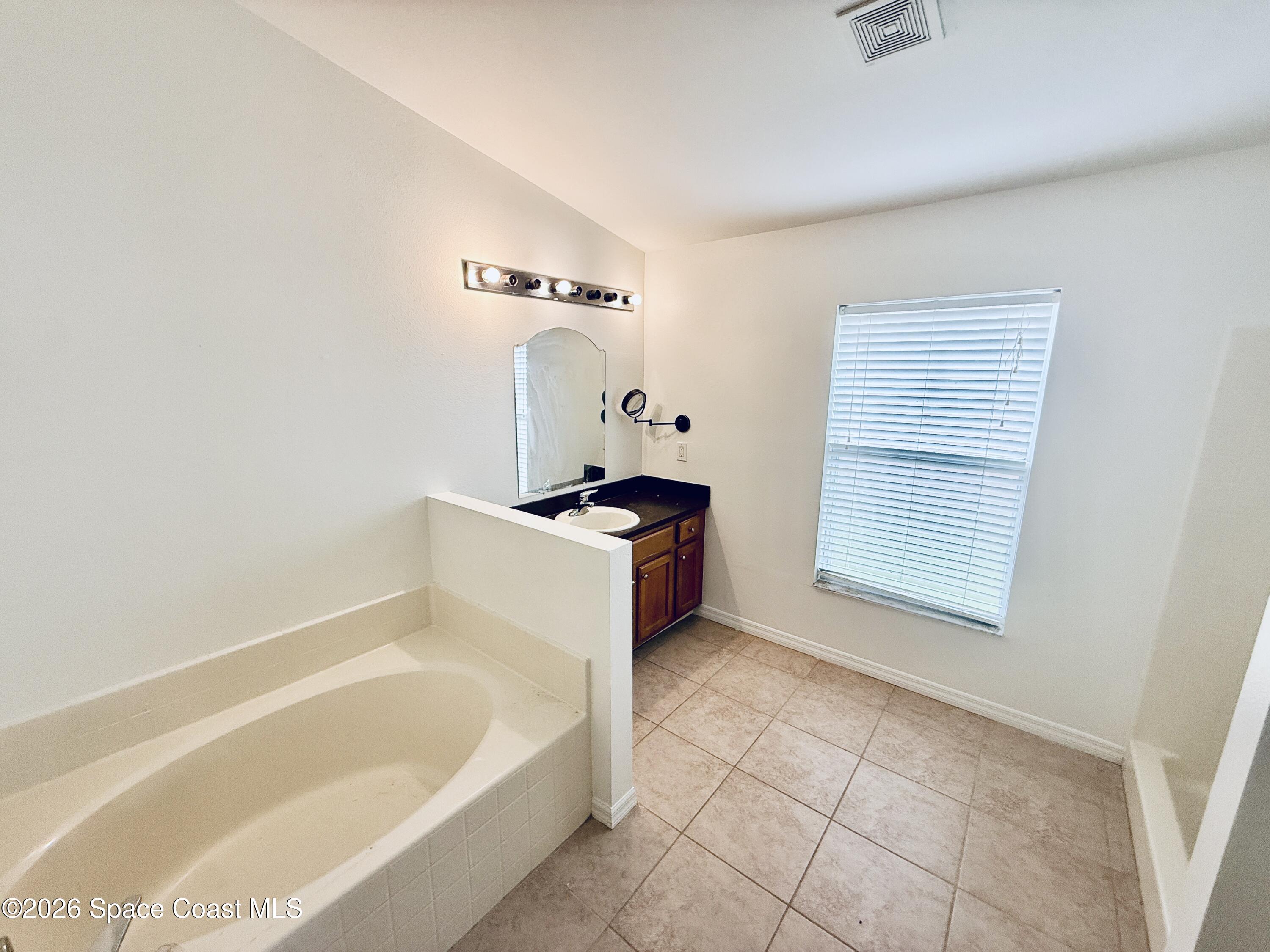 1183 Brumpton Place Rockledge, FL 32955 - Photo 9 of 23 20260317_163048824_iOS