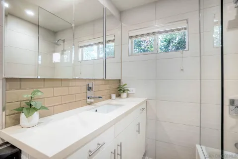 a bathroom with a sink and a bathtub