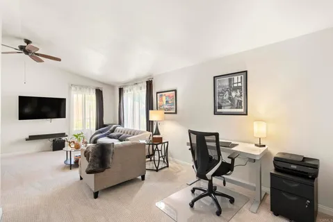 a view of a workspace with furniture