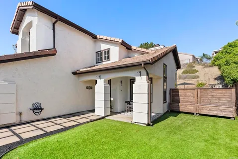a view of a back yard of the house