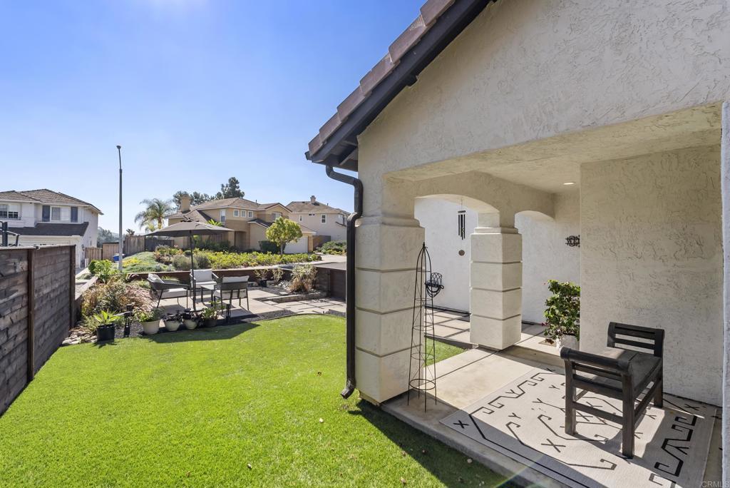 2225 Baxter Canyon Road Vista, CA 92081 - Photo 4 of 46 a view of yard from a corridor