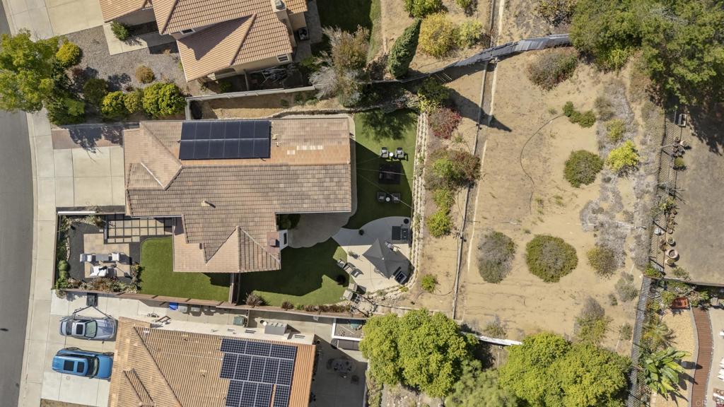2225 Baxter Canyon Road Vista, CA 92081 - Photo 44 of 46 a aerial view of a house with a garden