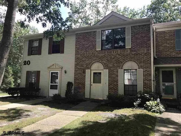 a front view of house with yard