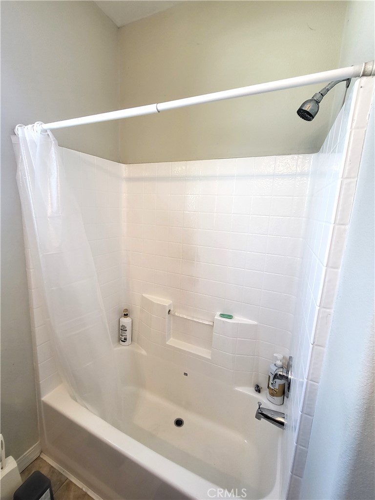 2103 West 245th Street, Unit 10 Torrance, CA 90717 - Photo 17 of 21 a bathroom with a bathtub