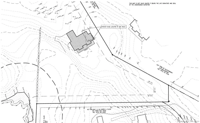 a view of a hallway with white walls