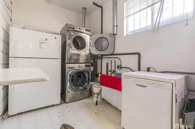 a storage room with washer and dryer