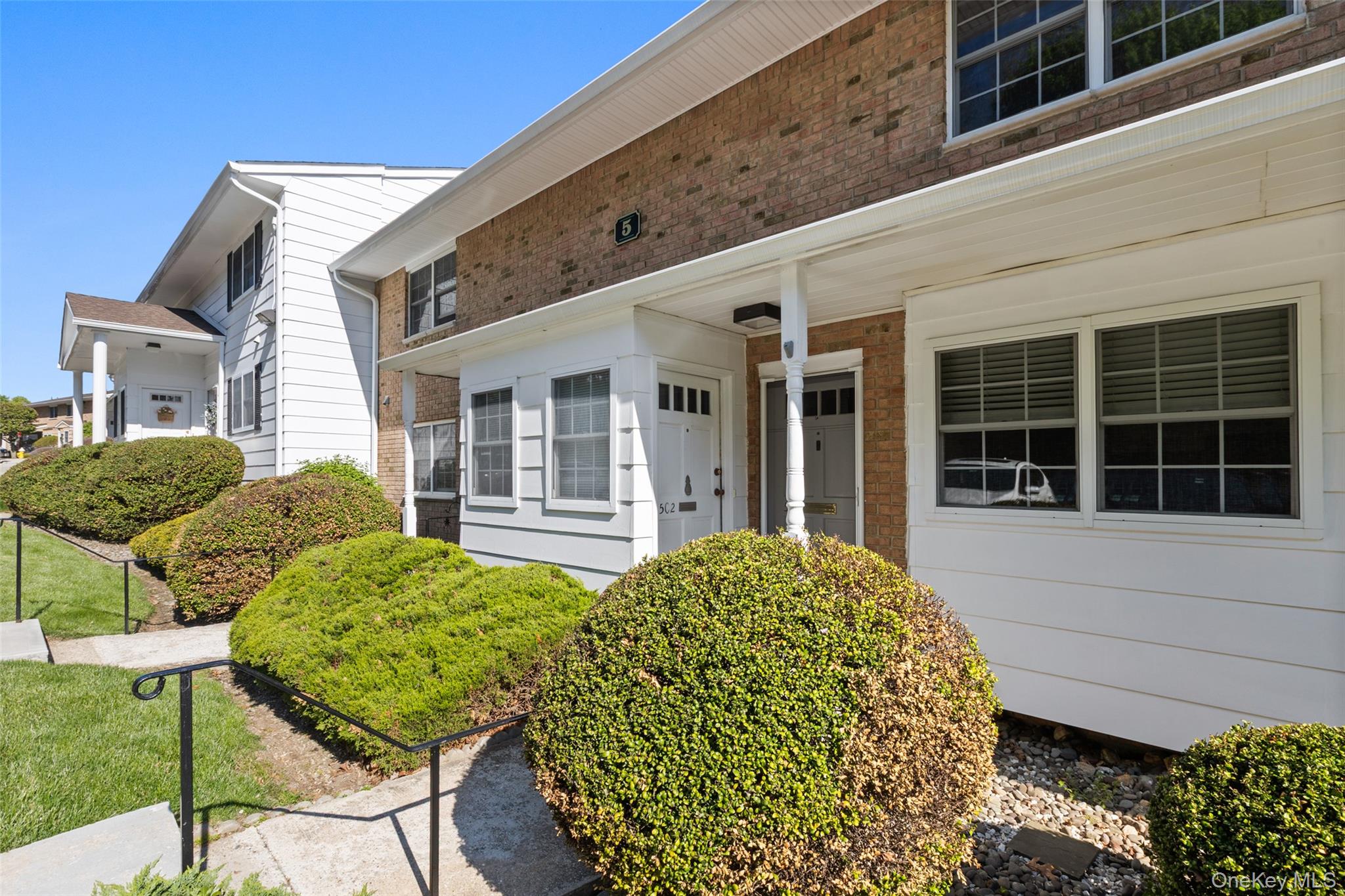 1840 Crompond Road, Unit 5C2 Peekskill, NY 10566 - Photo 19 of 27 a view of a house with backyard and sitting area