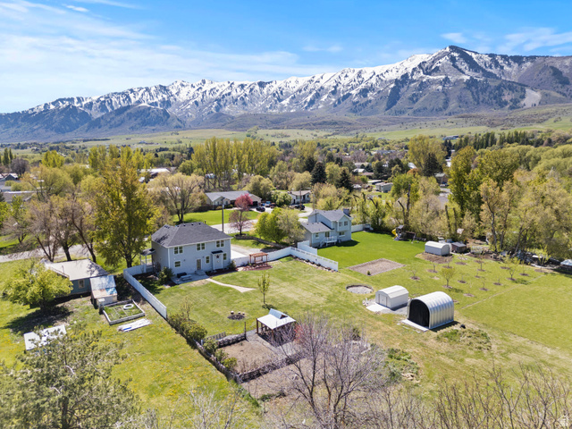75 East 200 North Mendon, UT 84325 - Photo 31 of 36 Aerial perspective of suburban area with a mountain backdrop