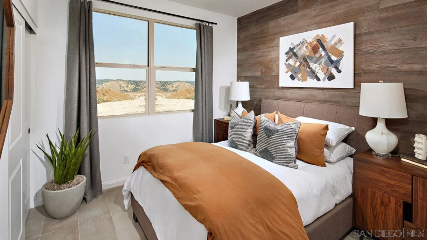 2193 Trevi Circle Chula Vista, CA 91913 - Photo 12 of 16 a bedroom with bed and a window