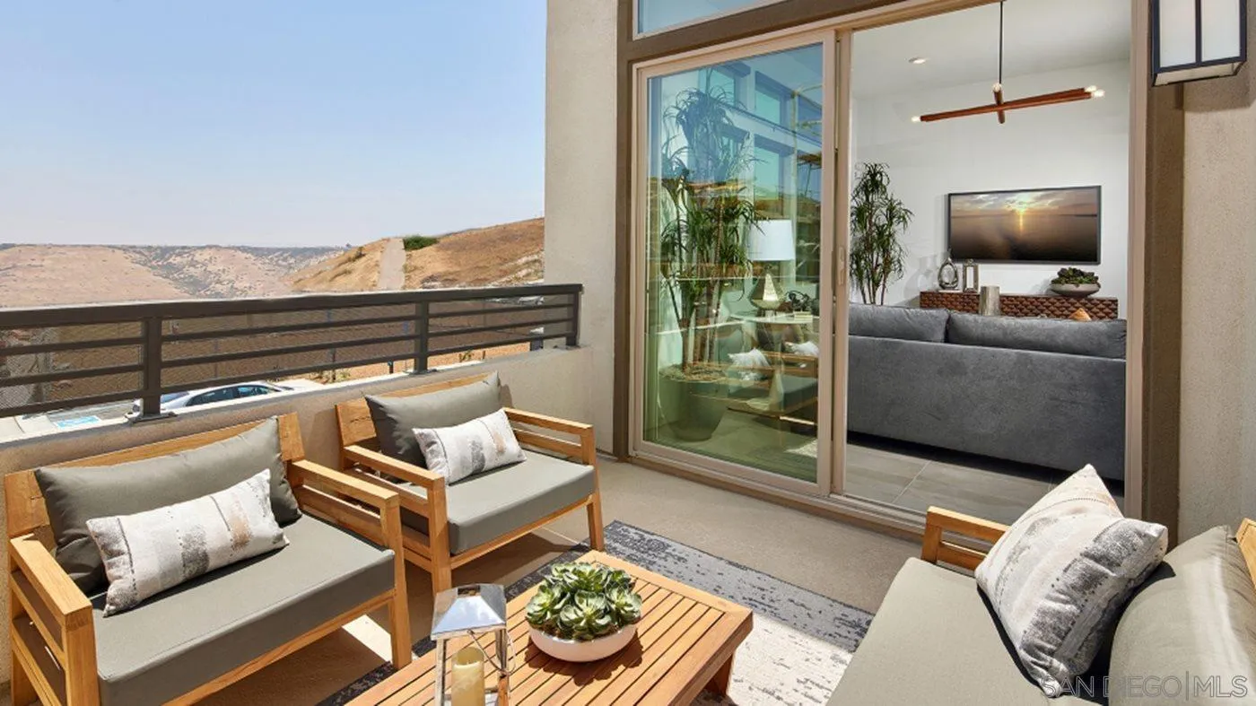 2193 Trevi Circle Chula Vista, CA 91913 - Photo 16 of 16 a living room with furniture and a flat screen tv