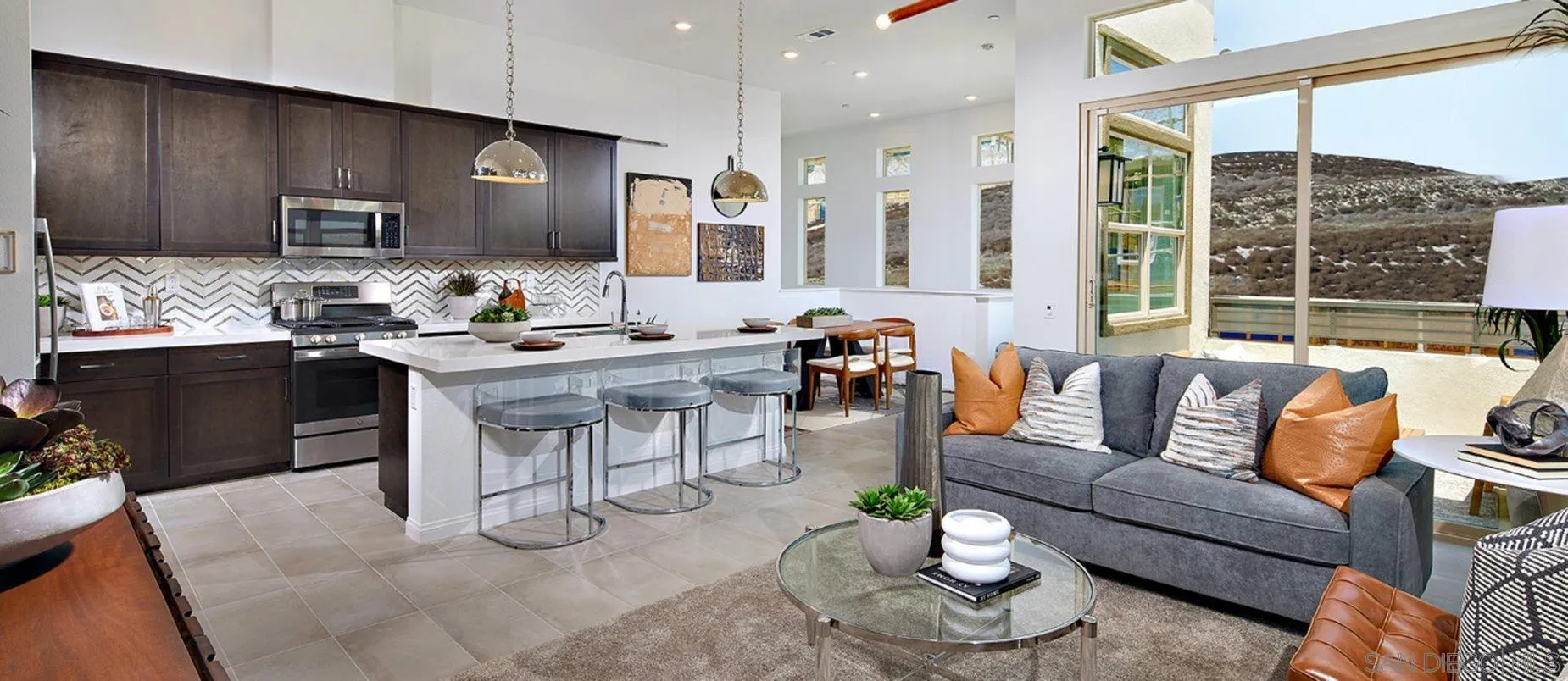 2193 Trevi Circle Chula Vista, CA 91913 - Photo 3 of 16 a living room with furniture kitchen and a large window