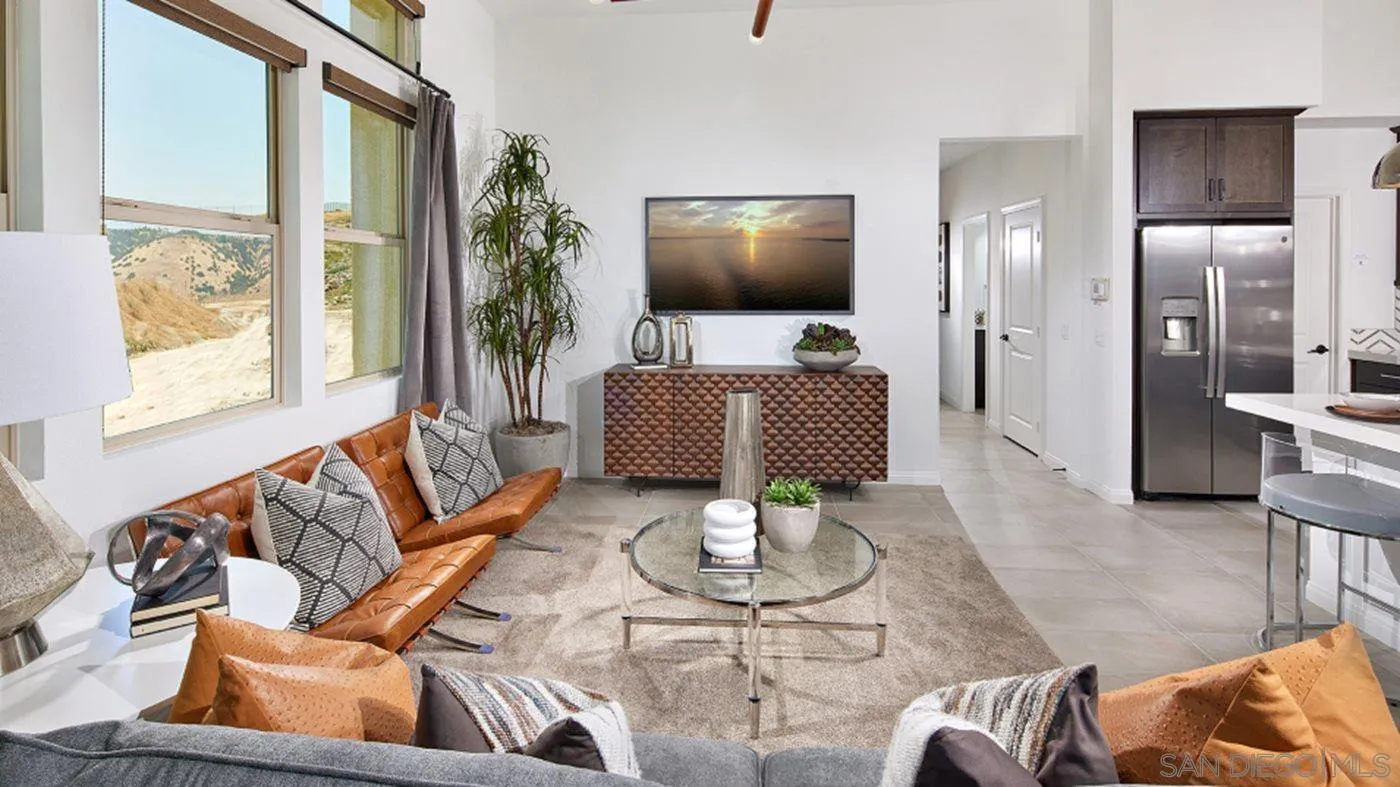 2193 Trevi Circle Chula Vista, CA 91913 - Photo 8 of 16 a living room with furniture and a flat screen tv