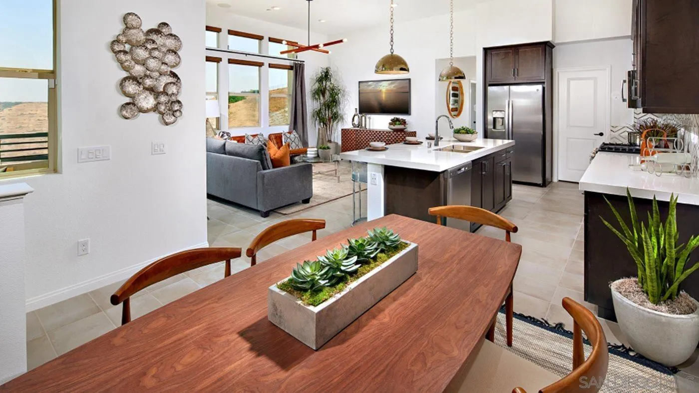 2193 Trevi Circle Chula Vista, CA 91913 - Photo 9 of 16 a living room with furniture fireplace and flat screen tv