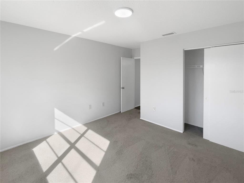 7846 Cayuga Drive New Port Richey, FL 34653 - Photo 15 of 32 a view of an empty room with a window