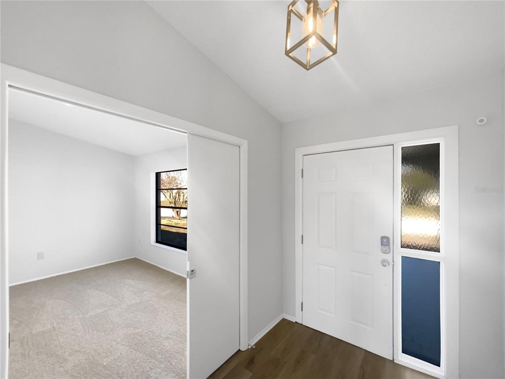 7846 Cayuga Drive New Port Richey, FL 34653 - Photo 27 of 32 a view of an empty room and window