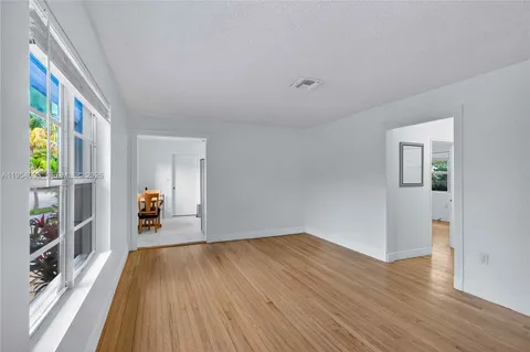 a view of livingroom with furniture and wooden floor