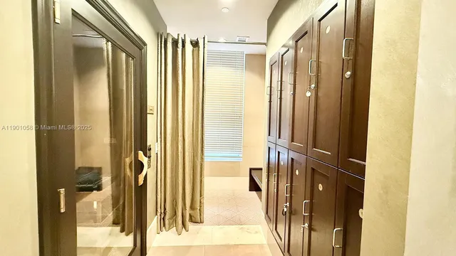 a view of a swimming pool with sitting area