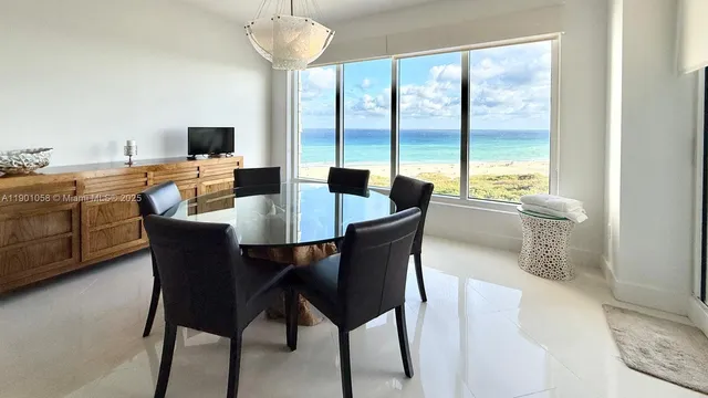 a bathroom with a tub and a shower