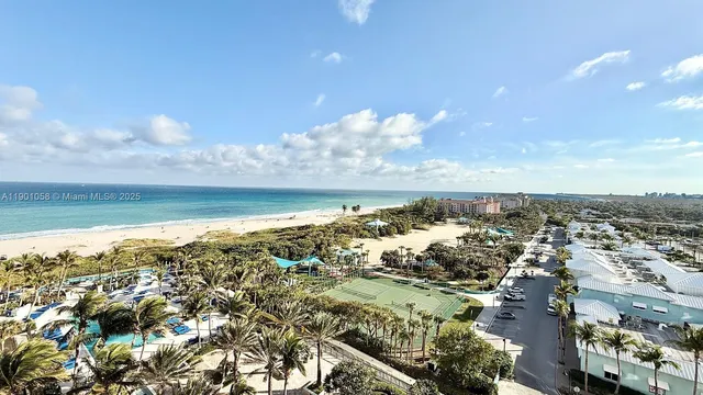 a bedroom with a flat screen tv and a bed