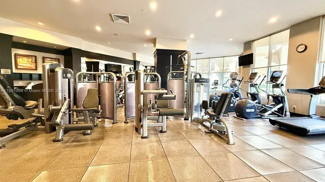 a kitchen with granite countertop a sink and a stove