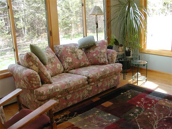 138 Pond Brook Road Huntington, MA 01050 - Photo 11 of 22 a living room with furniture and a large window
