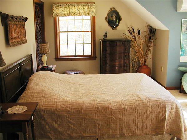 138 Pond Brook Road Huntington, MA 01050 - Photo 18 of 22 a bedroom with a bed and a window
