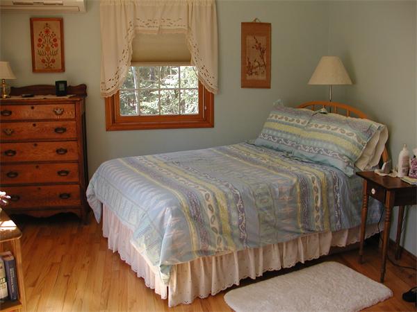 138 Pond Brook Road Huntington, MA 01050 - Photo 9 of 22 a bedroom with a bed and a window