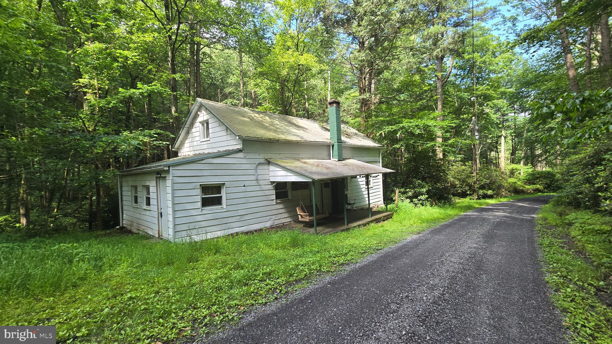 212 Thickhead Mountain Road Centre Hall, PA 16828 - Photo 2 of 28 Charming retreat nestled in lush greenery.