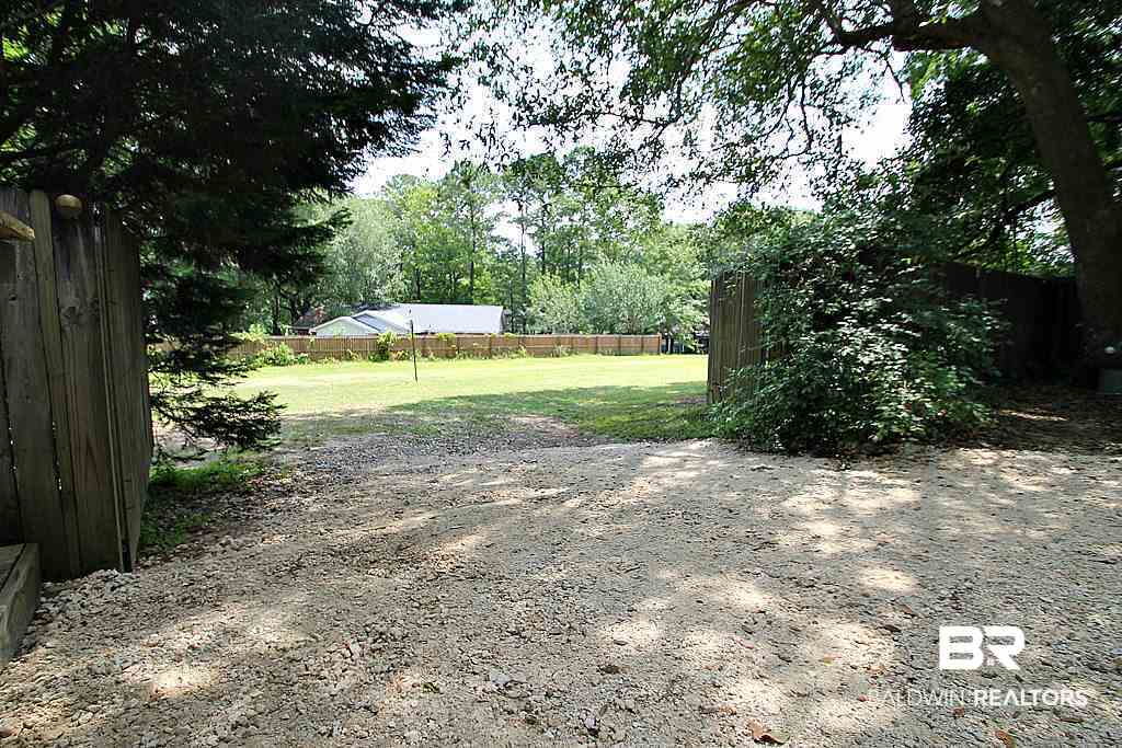 106 Winnetk Circle Daphne, AL 36526 - Photo 35 of 39 100ft Utility Easement behind house