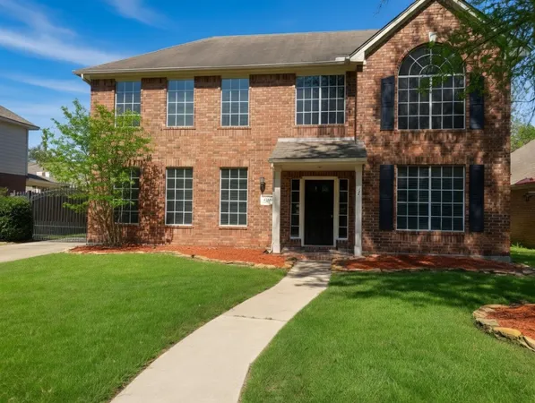 a kitchen with stainless steel appliances granite countertop a sink stove and microwave