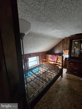 a view of livingroom with furniture and windows