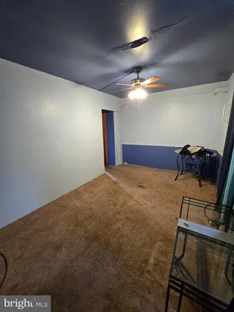 a bed room with a bed and a mirror
