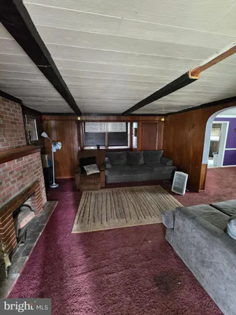 a view of a livingroom with furniture