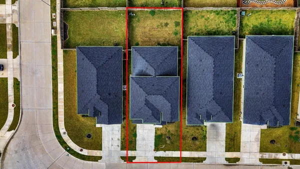 a view of swimming pool with a yard and patio