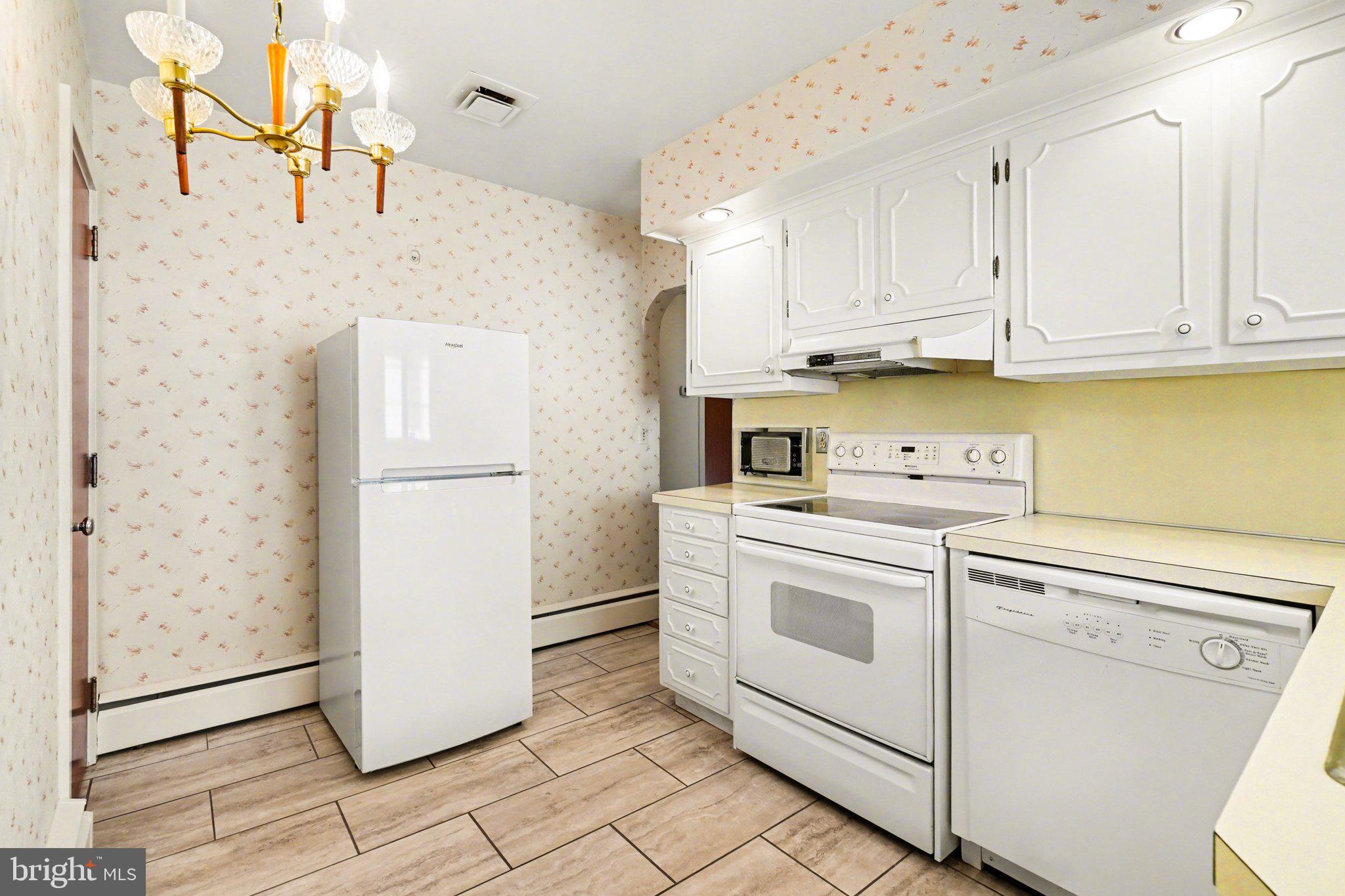 210 West Chestnut Street Cleona, PA 17042 - Photo 16 of 35 a kitchen with a refrigerator sink stove and cabinets