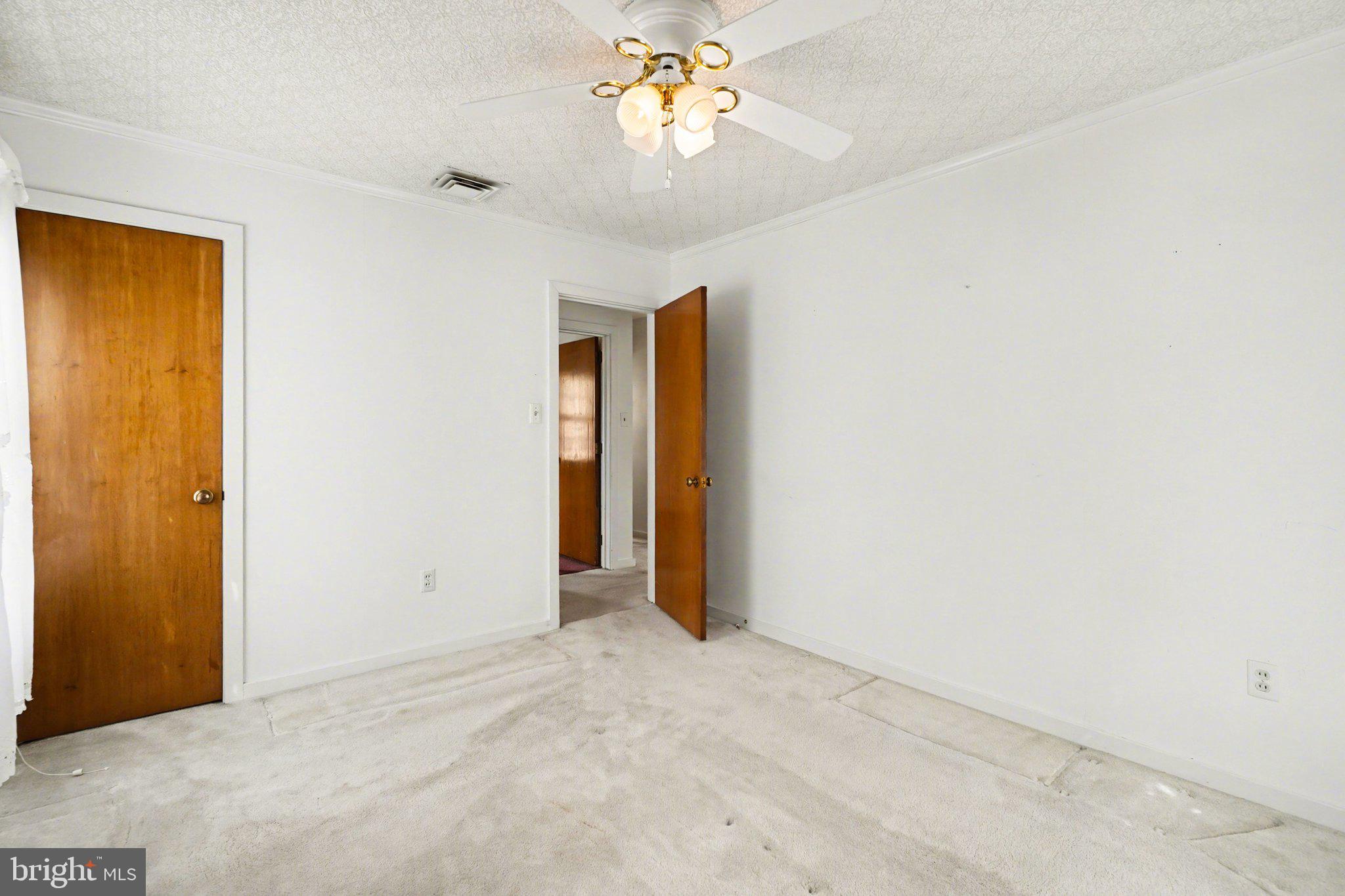 210 West Chestnut Street Cleona, PA 17042 - Photo 18 of 35 an empty room with closet and a chandelier fan