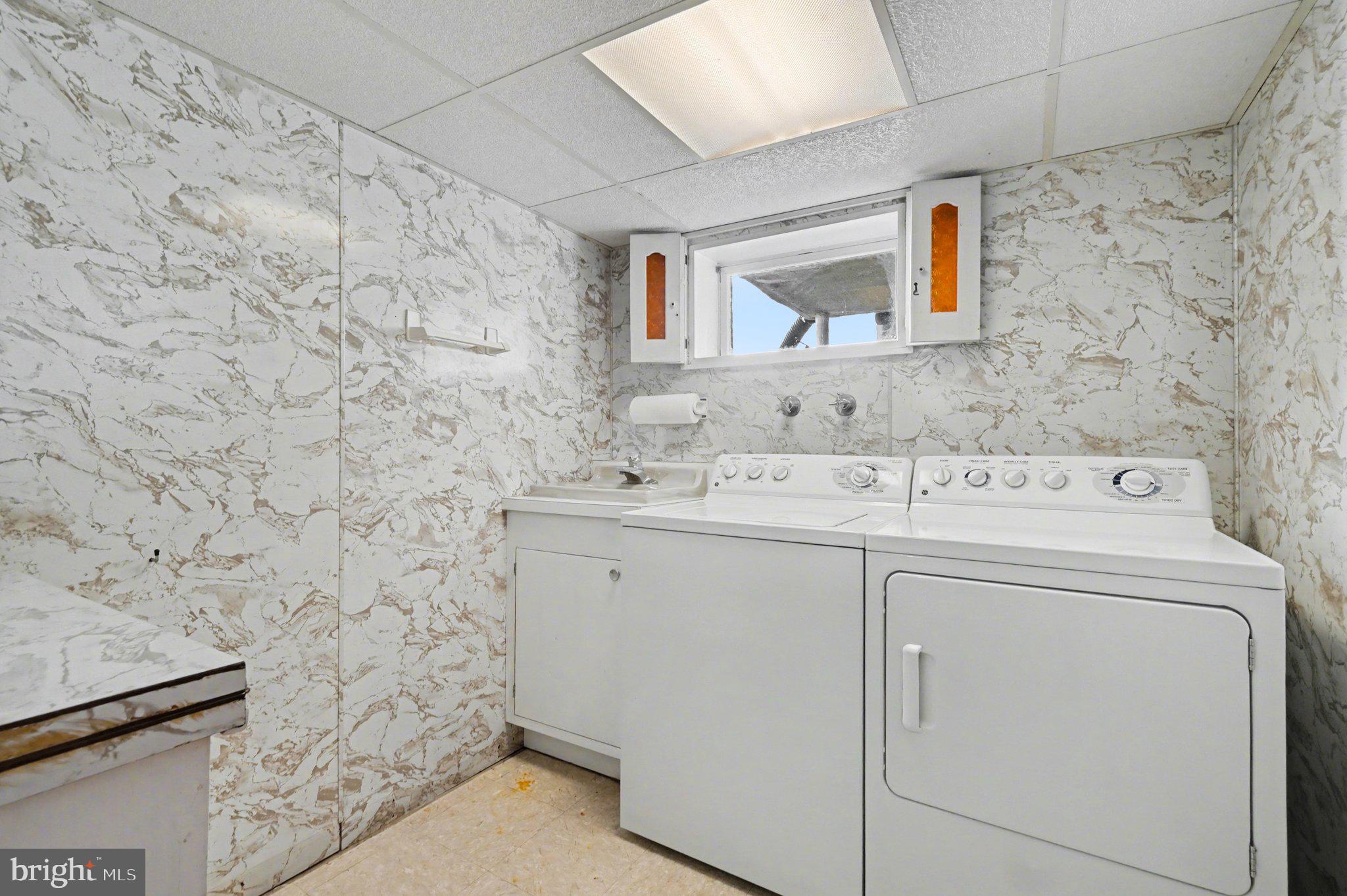 210 West Chestnut Street Cleona, PA 17042 - Photo 27 of 35 a utility room with a sink and a washer dryer