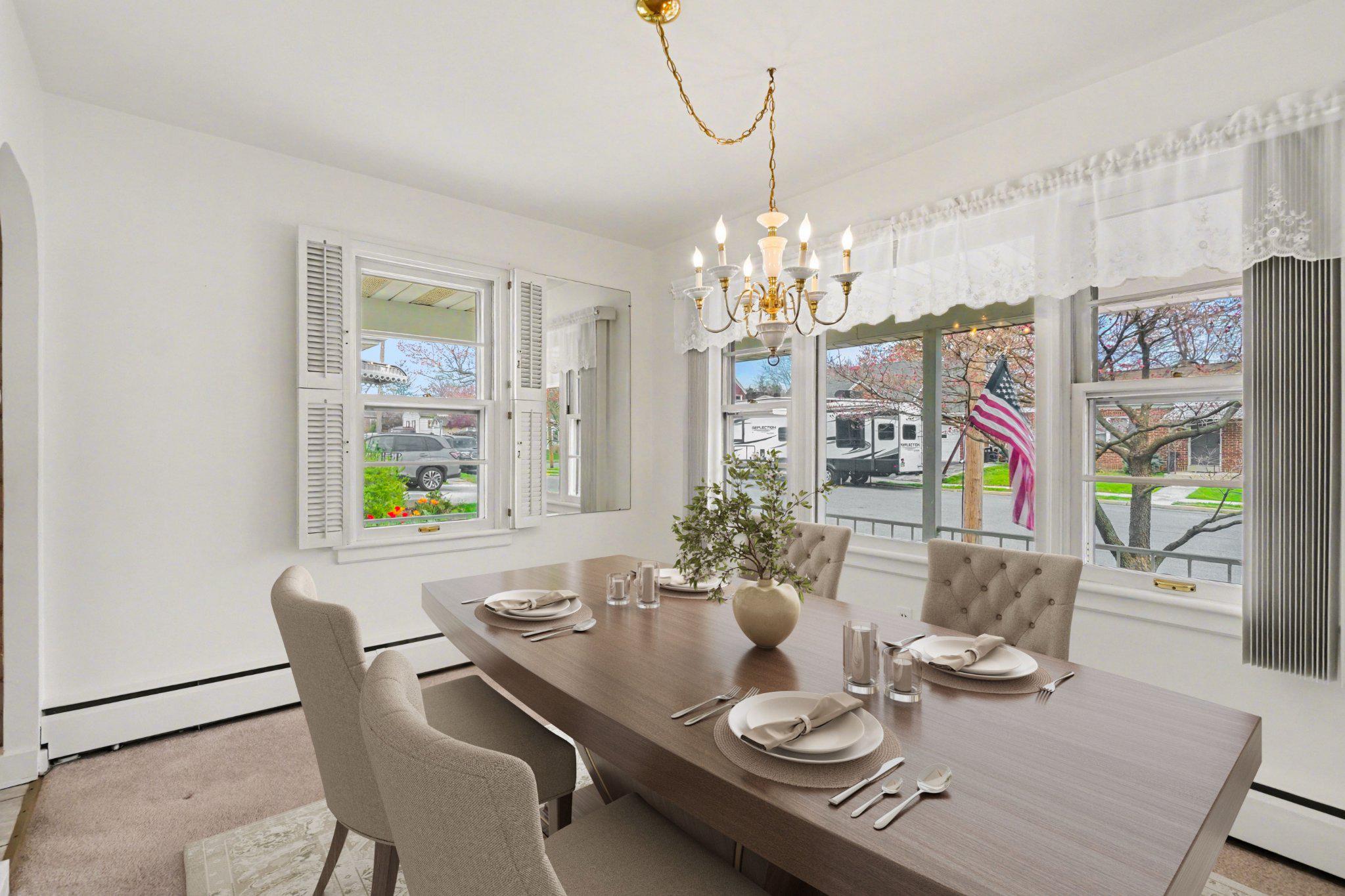 210 West Chestnut Street Cleona, PA 17042 - Photo 5 of 35 a view of a dining room with furniture a chandelier and wooden floor