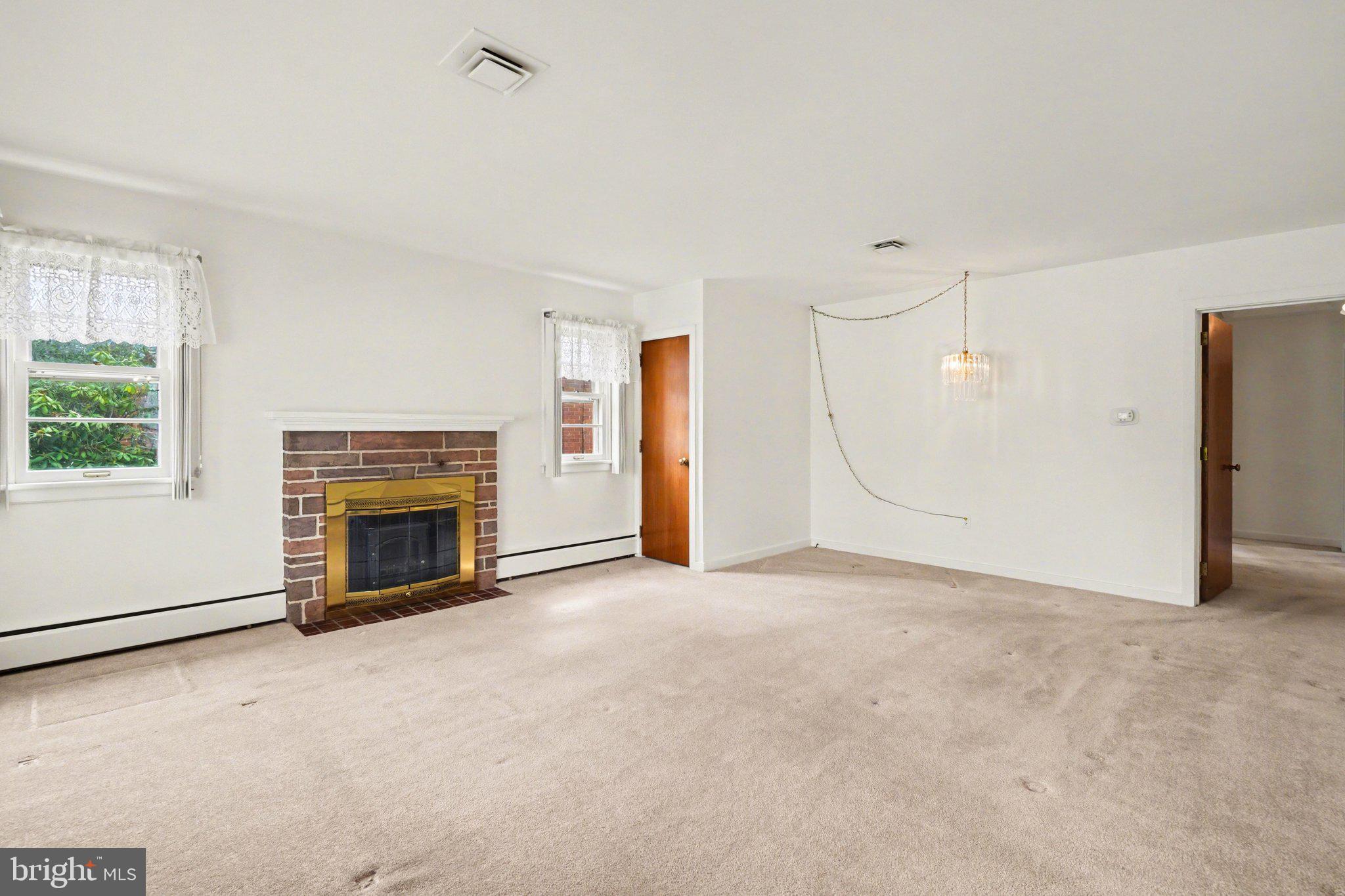 210 West Chestnut Street Cleona, PA 17042 - Photo 10 of 35 a view of empty room with a fireplace