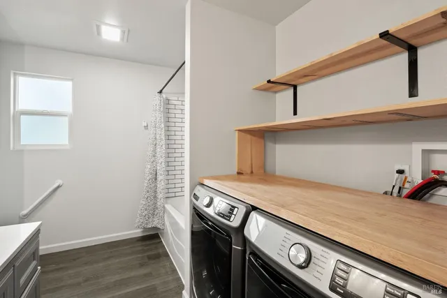 a utility room with dryer and washer