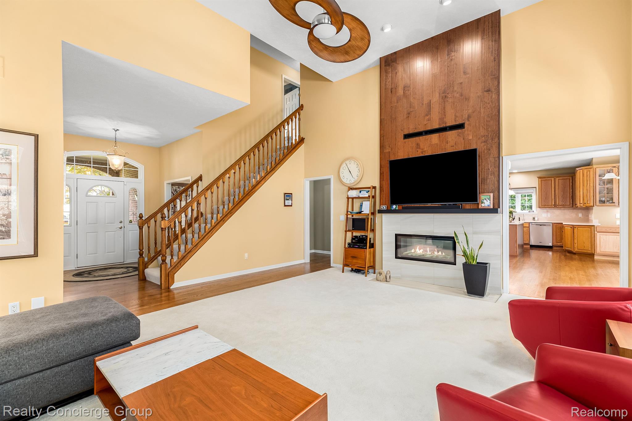 9761 Quail Ridge Run Brighton, MI 48114 - Photo 7 of 30 Dbl fireplace is the focal point of the room